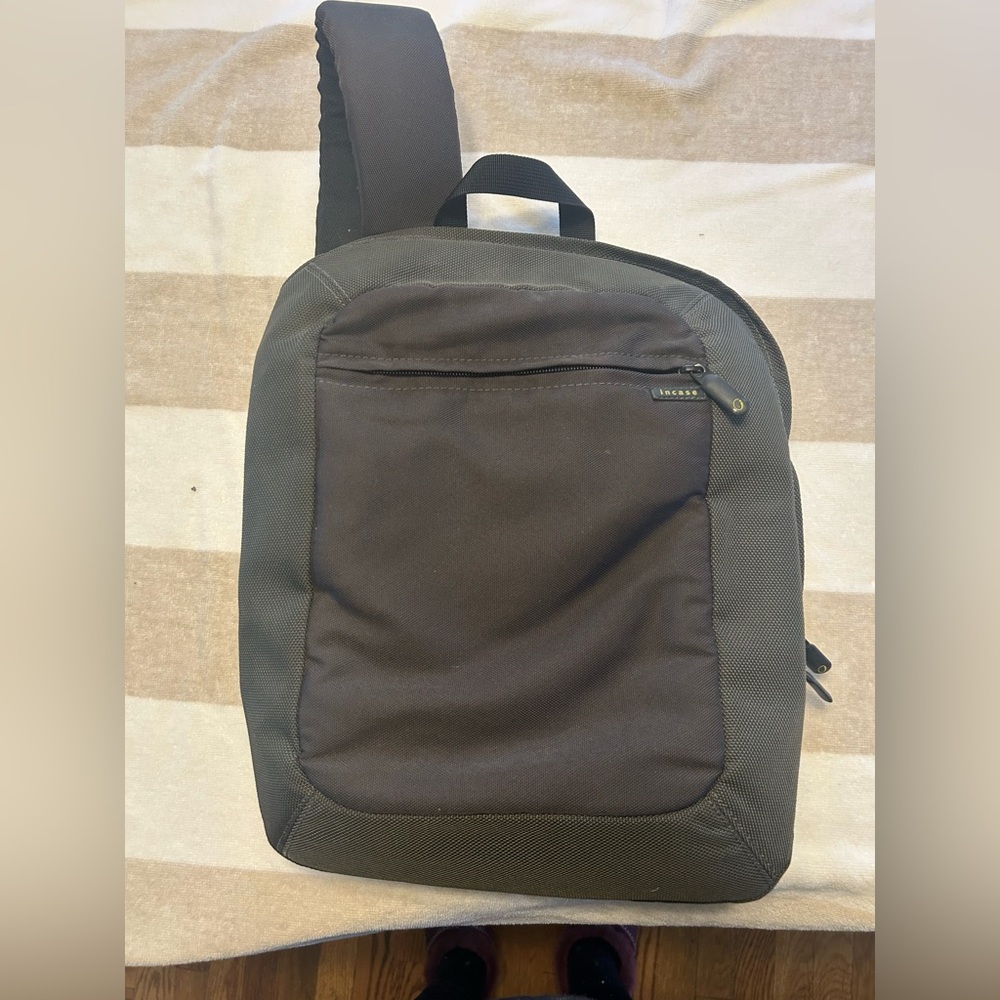 Perfect condition waterproof Incase charcoal colored sling computer bag